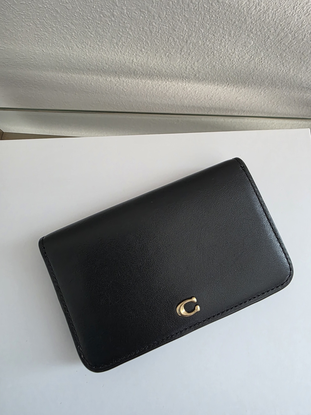 Coach Black Leather Card Case with Gold 'C' Accent